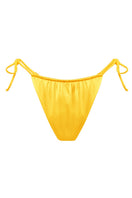 Yellow glossy bikini bottom from Suncillo Virna Sicily collection, featuring a sleek, shiny fabric and modern design.