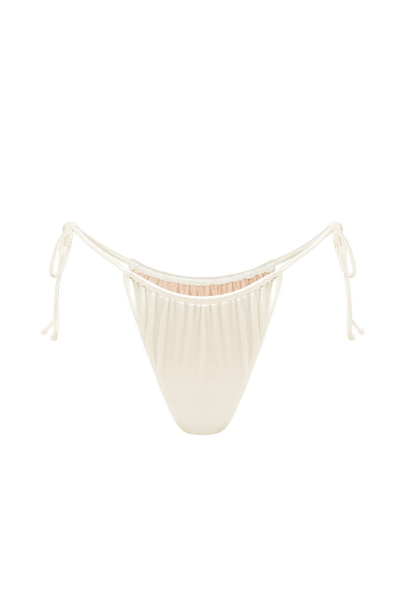 White pearl glossy bikini bottom by Suncillo, featuring a sleek, shiny design and smooth fit for stylish beachwear.