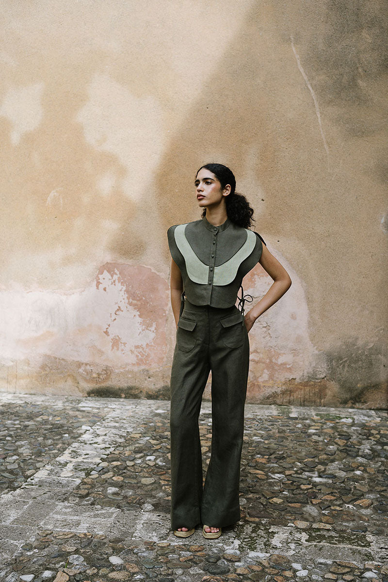 ANA + MARIA Vivra Bib in lichen green and sage green, featuring a soft, stylish top with a comfortable fit.