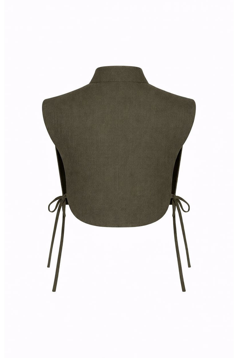 ANA + MARIA Vivra bib in lichen green and sage green, showing the stylish, soft fabric and adjustable straps.