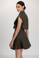 VIVRA bib in lichen green and sage green, featuring soft fabric and adjustable straps, designed by ANA + MARIA.