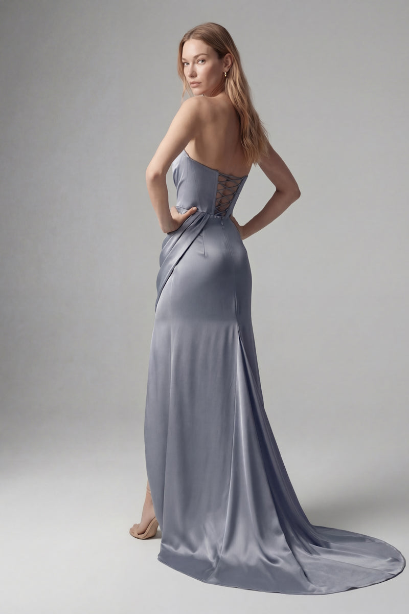 Elegant blue gown from Monetre, featuring a flowing design and sophisticated style, perfect for formal occasions.