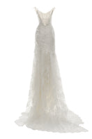 Off-white Fleur Antique gown by Monetre featuring elegant, flowing fabric and intricate detailing perfect for formal occasions.