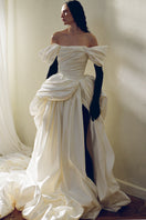 Elegant Venera Blanche gown by Monetre, flowing white dress with delicate details, perfect for formal occasions.