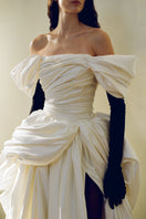 Elegant Venera Blanche gown by Monetre featuring flowing fabric and intricate detailing, perfect for formal occasions.