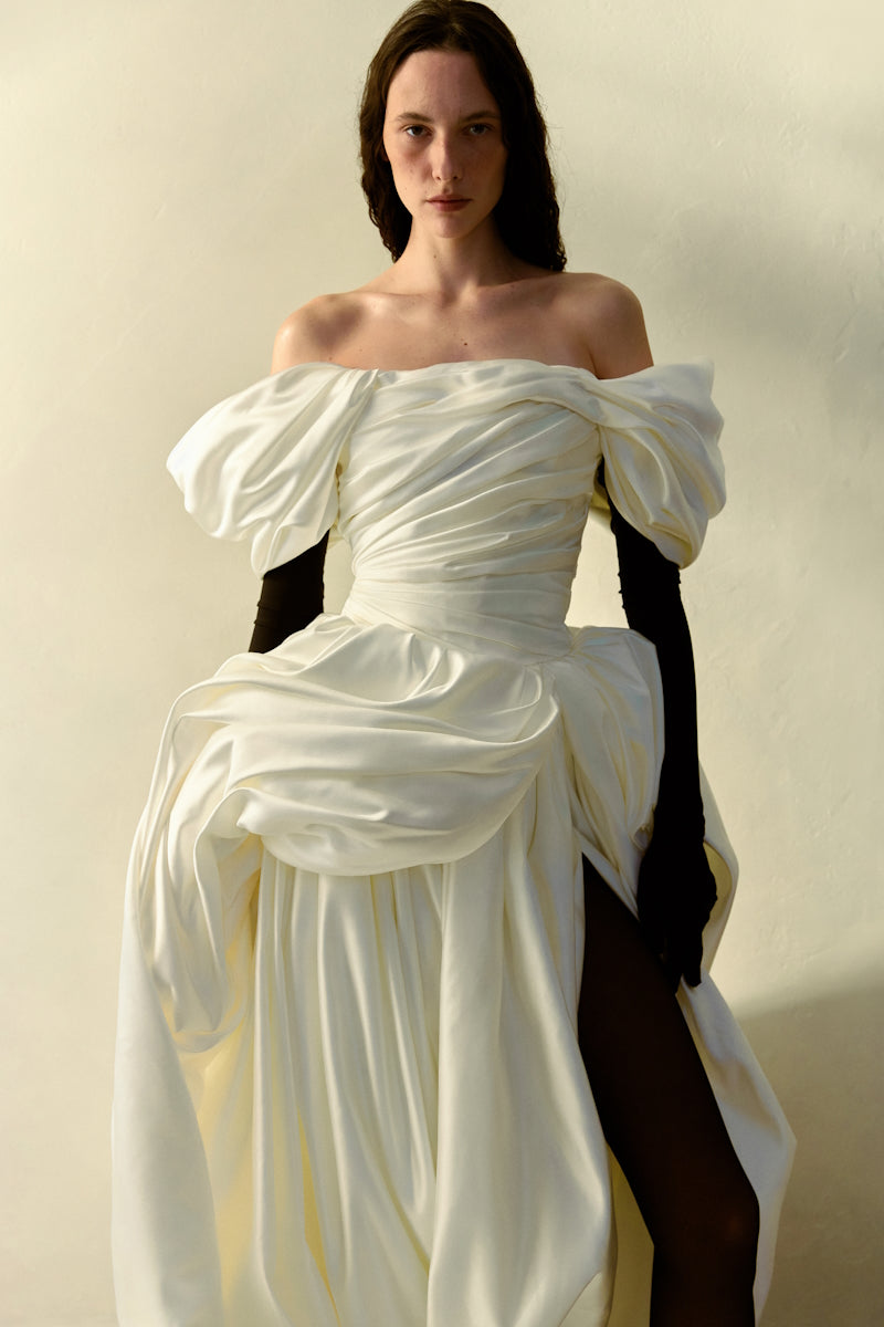 Elegant Venera Blanche gown by Monetre, featuring flowing fabric and intricate design, perfect for formal occasions.