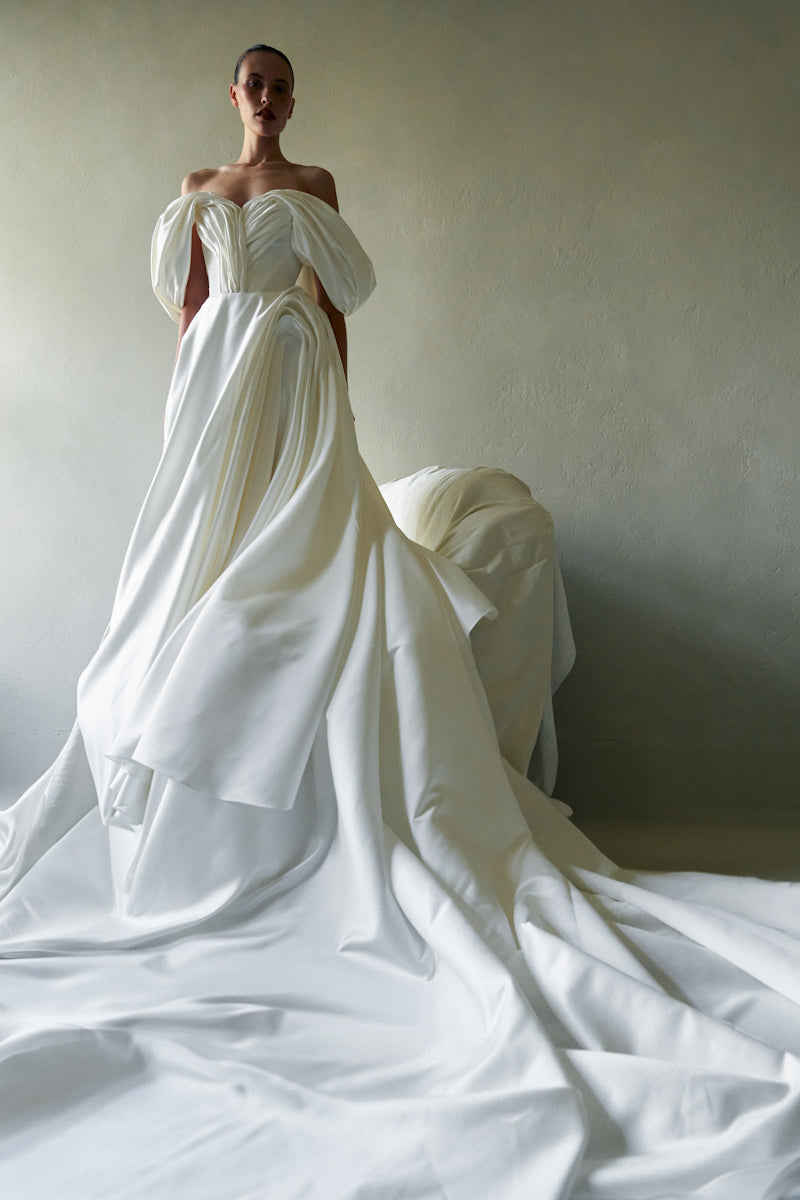 Elegant Grace Gown by Monetre featuring flowing fabric and intricate design, perfect for formal occasions.