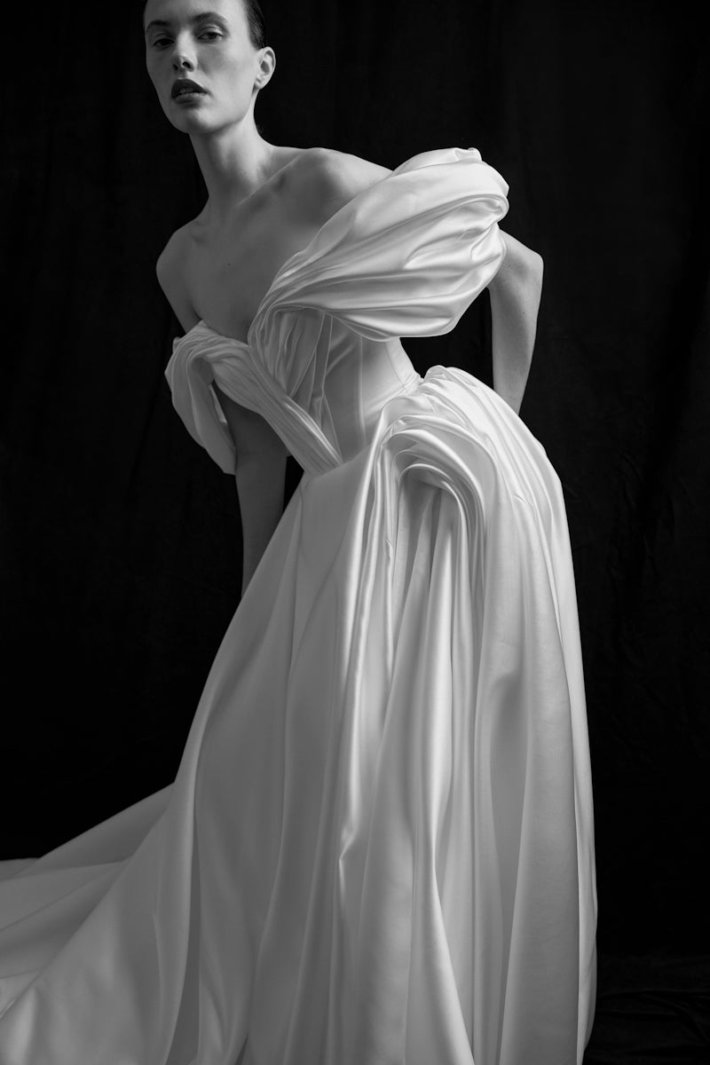 Elegant Grace Gown by Monetre featuring flowing fabric and intricate design, perfect for formal occasions.