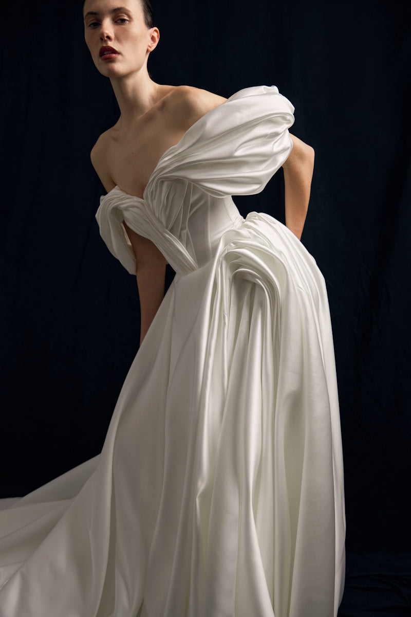 Elegant Grace Gown by Monetre featuring flowing fabric and intricate details, perfect for formal occasions.