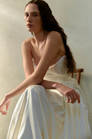 Elegant Luna gown by Monetre featuring flowing fabric and intricate design, perfect for formal occasions.