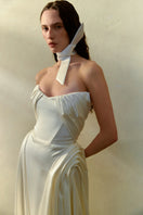 Elegant Luna Gown by Monetre featuring flowing fabric and intricate detailing, perfect for formal occasions.