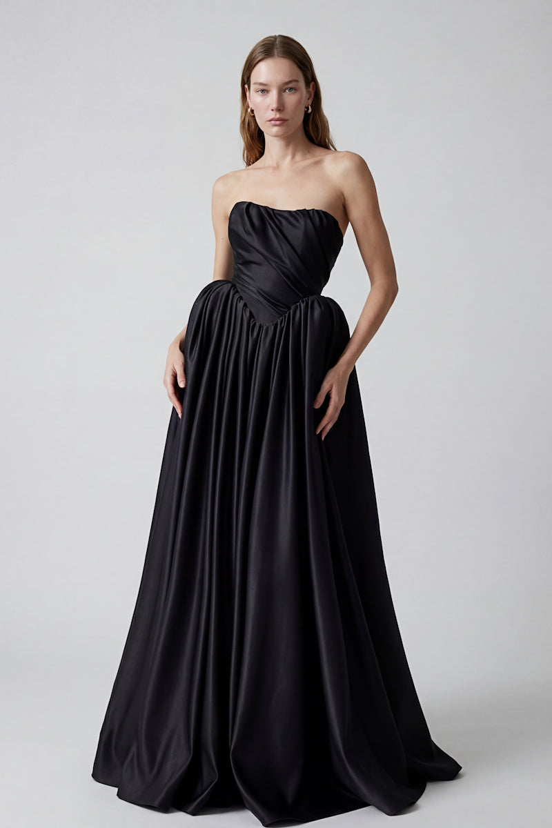 Elegant black Eterna gown by Monetre featuring a flowing design, perfect for formal occasions and evening wear.