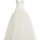 Off-white Alaya Measure gown by Monetre featuring flowing fabric and elegant design, perfect for formal occasions.