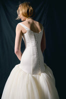 Elegant ALAYA Measure Gown by Monetre featuring flowing fabric and intricate detailing, perfect for formal occasions.