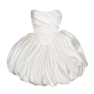 Monetre Lilith Petal gown in off-white fabric, showcasing elegant floral design and flowing silhouette for sophisticated style.