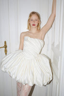Elegant Lilith Petal gown by Monetre featuring flowing fabric and floral-inspired design, perfect for formal occasions.