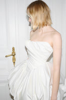 Elegant Lilith Petal gown by Monetre featuring flowing fabric and floral design, perfect for formal occasions.