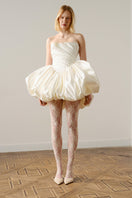 Elegant Lilith Petal gown by Monetre featuring soft pastel petals and flowing fabric, perfect for formal occasions.