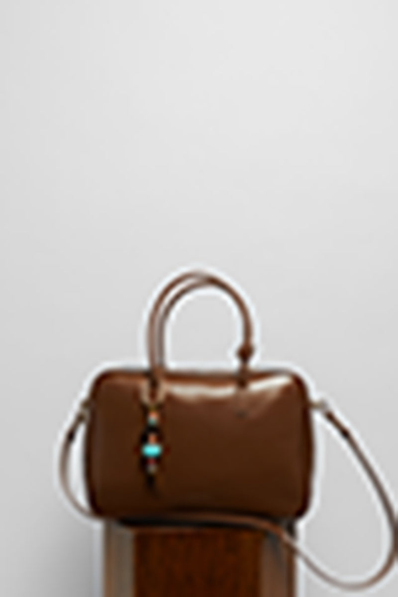 Top handle leather work bag in mocha from Folklore the Label, featuring a sleek design with sturdy handles and smooth leather finish.