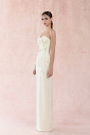 Elegant white feather charming gown by HACCHIC COUTURE featuring delicate feather details and flowing fabric.