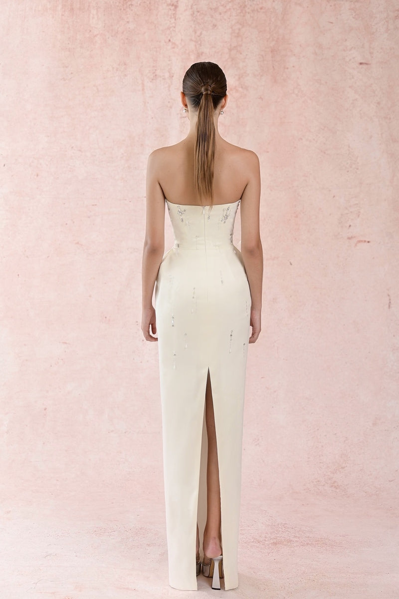 White feather charming gown by HACCHIC COUTURE featuring delicate feather details and elegant design, perfect for special occasions.
