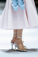 Christin Wu Whitney heels in Jasmine color, featuring elegant pointed toes and stylish block heels, showcased in a lifestyle setting.