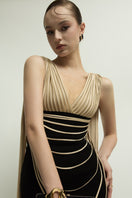 Jenny K Tran Whitshire dress in beige and black, stylish gown with elegant design, showcased in a high-quality product image.