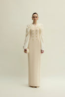 Jenny K Tran Willow gown in ivory and beige, flowing dress with elegant fabric and delicate design.