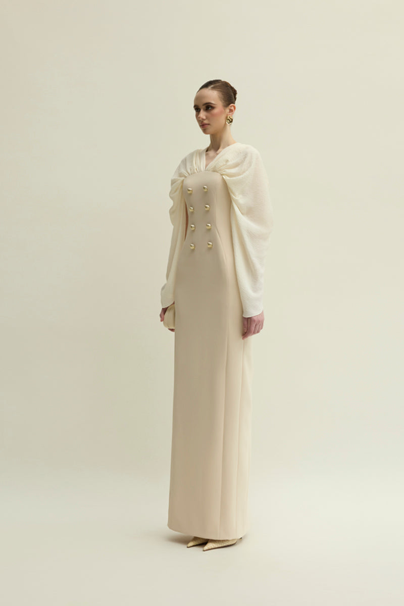 Jenny K Tran Willow dress in ivory and beige, elegant gown with flowing fabric and subtle detailing, perfect for special occasions.