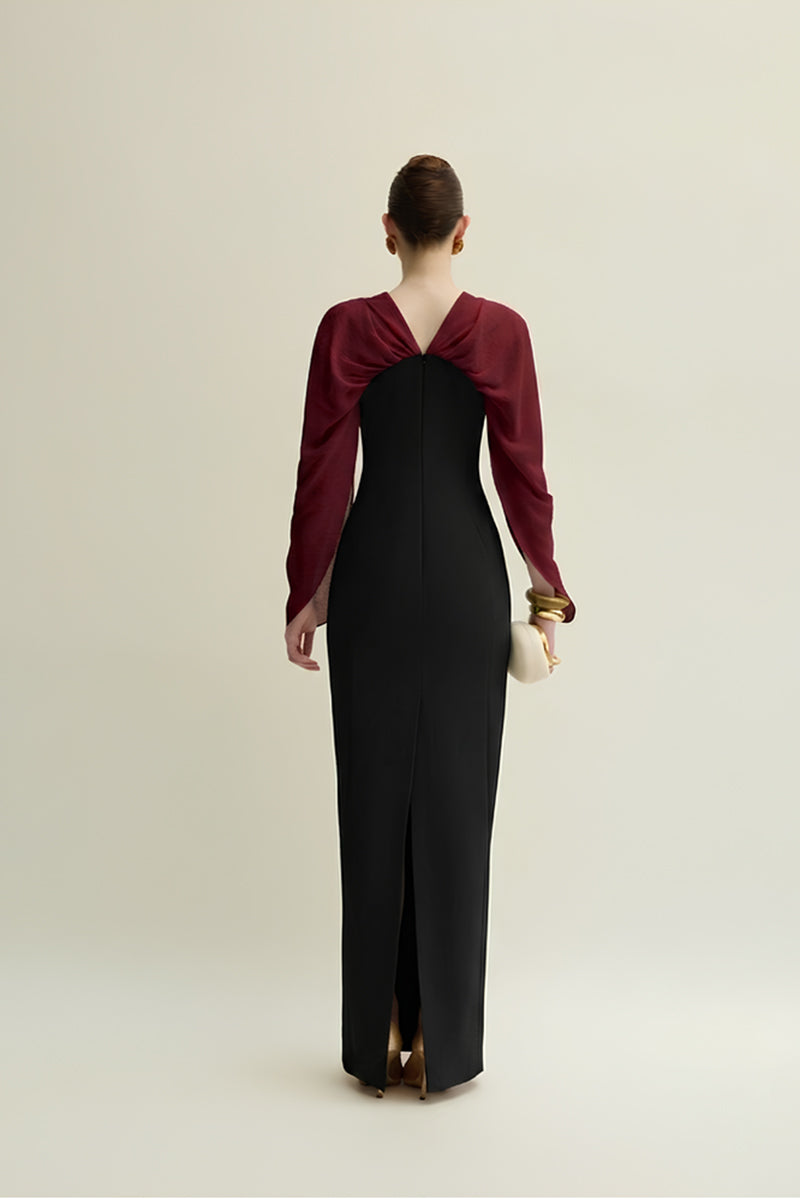 Elegant Jenny K Tran Willow gown in burgundy and black with flowing fabric and stylish design, perfect for formal occasions.