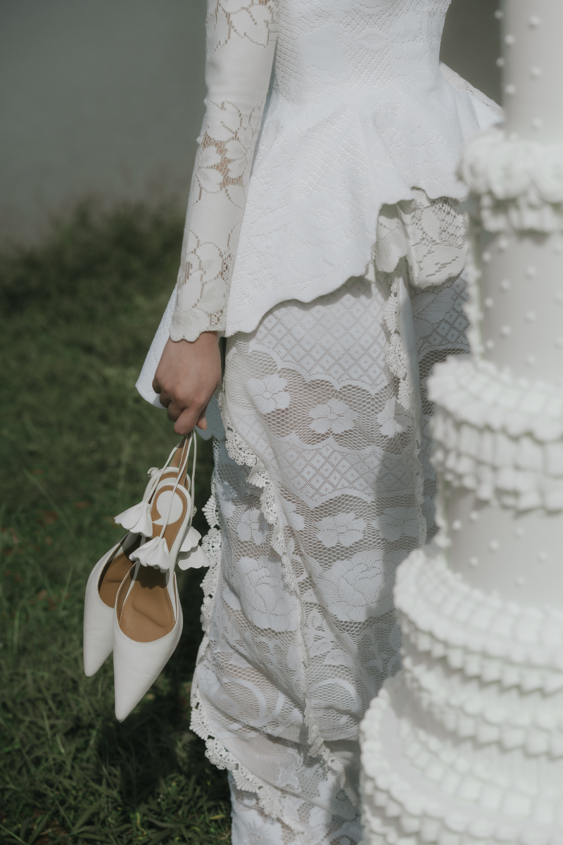 Christin Wu Willow heels featuring elegant design, showcased in a lifestyle image with neutral tones and stylish footwear details.