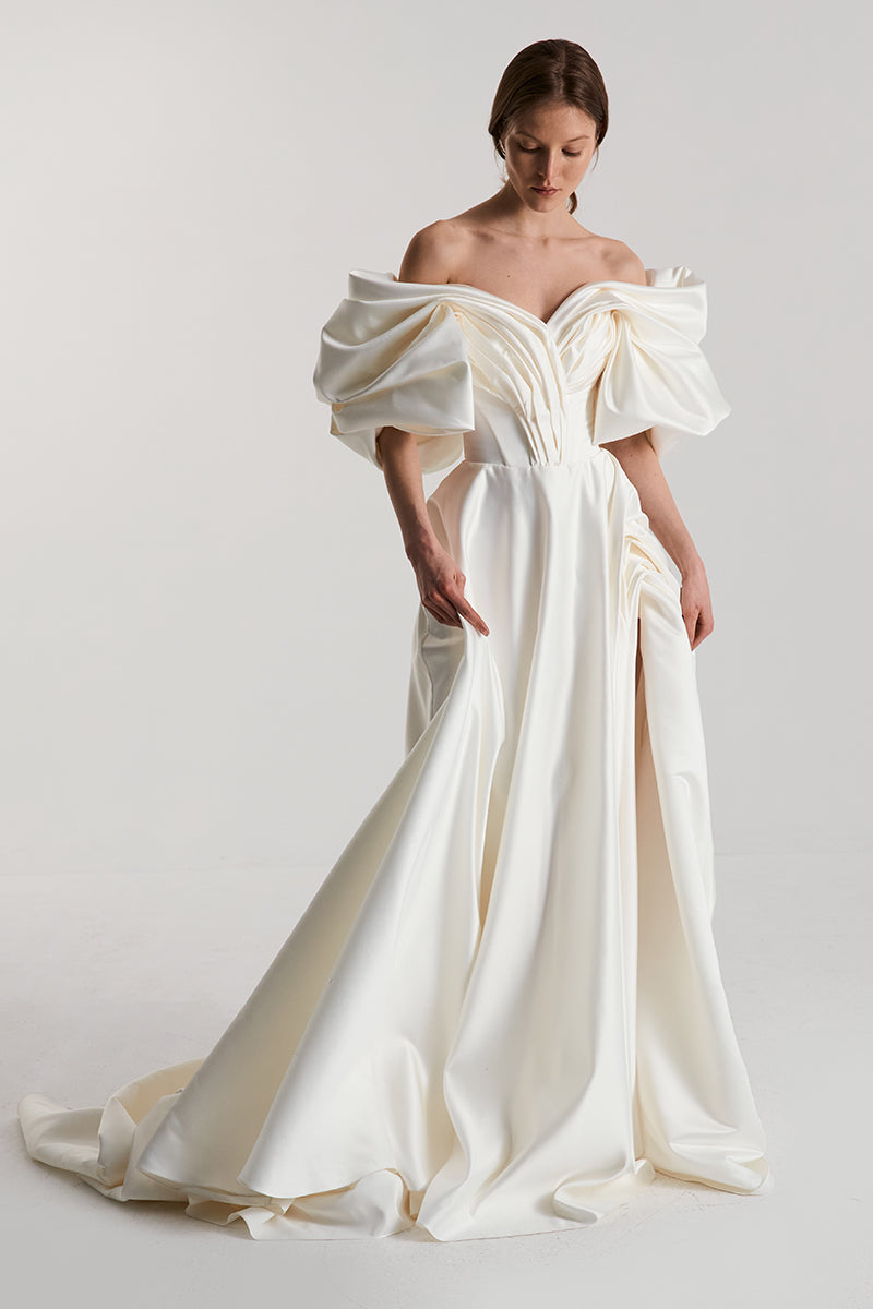 Elegant Off-White Volume Sculpted Gown by Monetre, featuring a flowing silhouette and intricate detailing in a sophisticated style.
