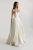 Off-white satin figure dress by Monetre, elegant maxi dress with flowing fabric and fitted waist, perfect for formal occasions.
