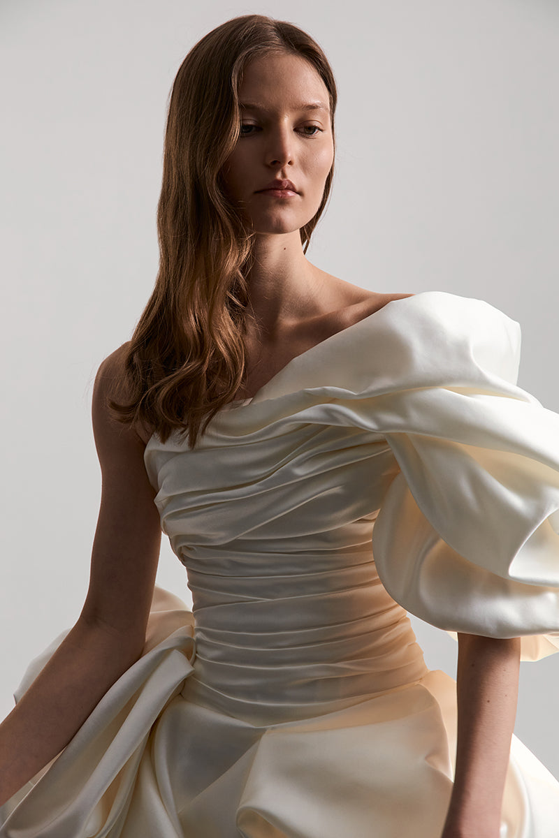 Monetre Bisou mini satin dress in off-white, featuring a sleek, fitted design ideal for elegant occasions.