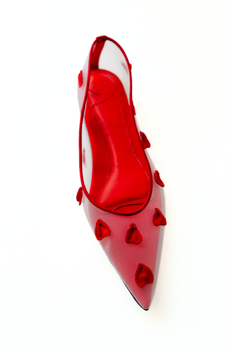 Christin Wu WYNNE flats in vibrant poppy color, showcasing sleek design and comfortable slip-on style.