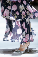 Christin Wu Wynonna heels in Edelweiss color, showcasing elegant high-heeled shoes with floral embroidery and stylish design.