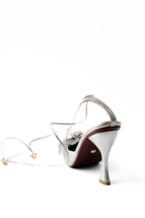 Christin Wu Wynonna heels in Edelweiss floral fabric with pointed toe and ankle strap, elegant women's footwear.