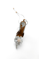 Christin Wu Wynonna Heels in Edelweiss with floral design, showcasing elegant straps and a sleek heel silhouette.