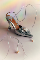 Christin Wu Wynonna heels in Edelweiss with floral embroidery, featuring pointed toes and elegant stiletto heels.