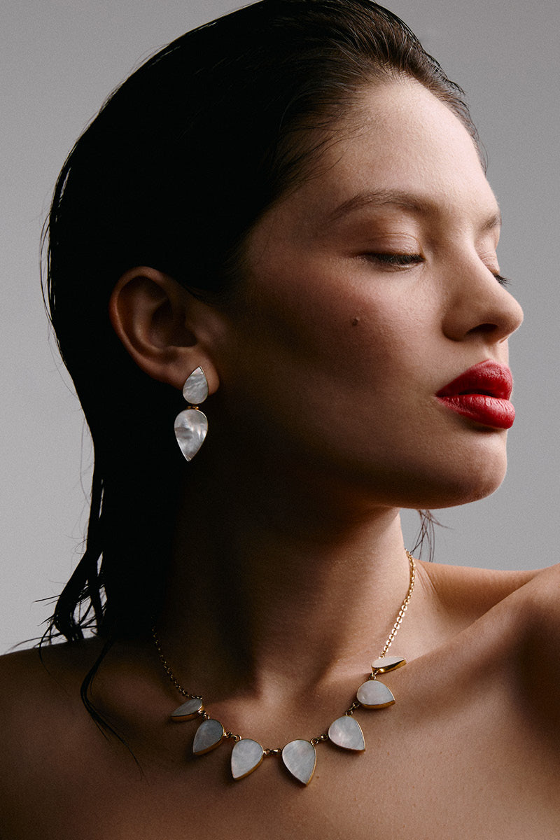 Gold Warrioress drop earrings by Freya Rose featuring elegant, elongated teardrop design with intricate detailing.