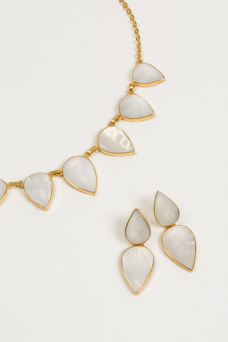 Gold Warrioress Drop Earrings by Freya Rose featuring elegant pearl accents and a sleek, modern design.