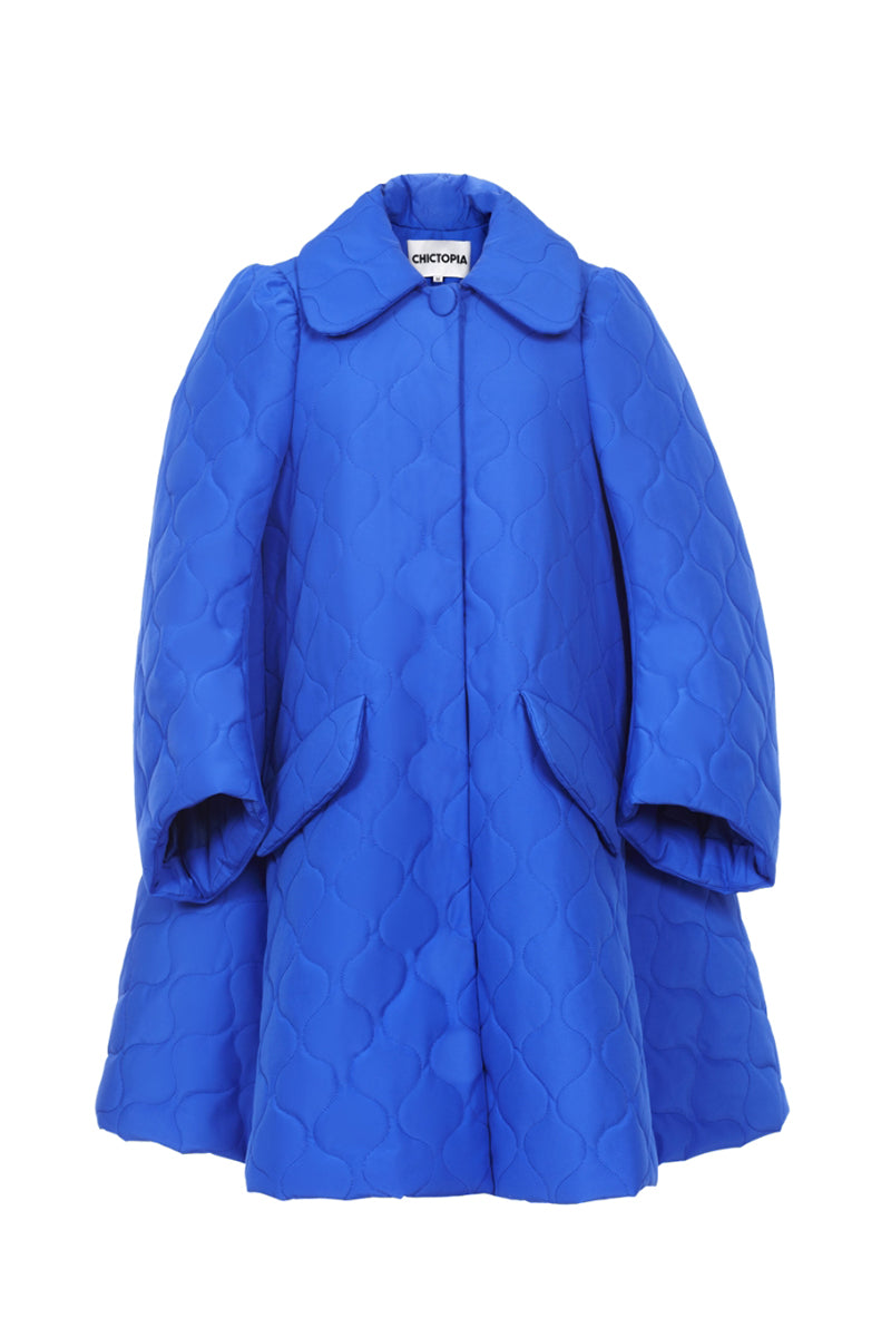 Blue quilt swing coat by Chictopia displayed on a hanger, showcasing its quilted pattern and stylish design.