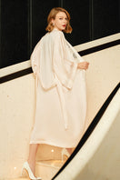 Pink silk wedding lace long robe by MANITO, featuring delicate lace details and flowing fabric, ideal for bridal wear.