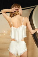 White wedding lace silk pajama set by MANITO featuring delicate lace details and smooth silk fabric, perfect for bridal loungewear.