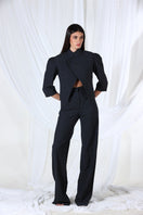 Black Aquarel Studio Lunar Blazer, tailored blazer with sleek design, shown on a hanger against a neutral background.