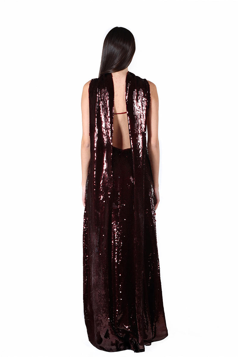 Amodel wearing the Aquarel Studio Eclipse Brown Maxi Dress, flowing brown maxi dress with a relaxed fit and elegant design.