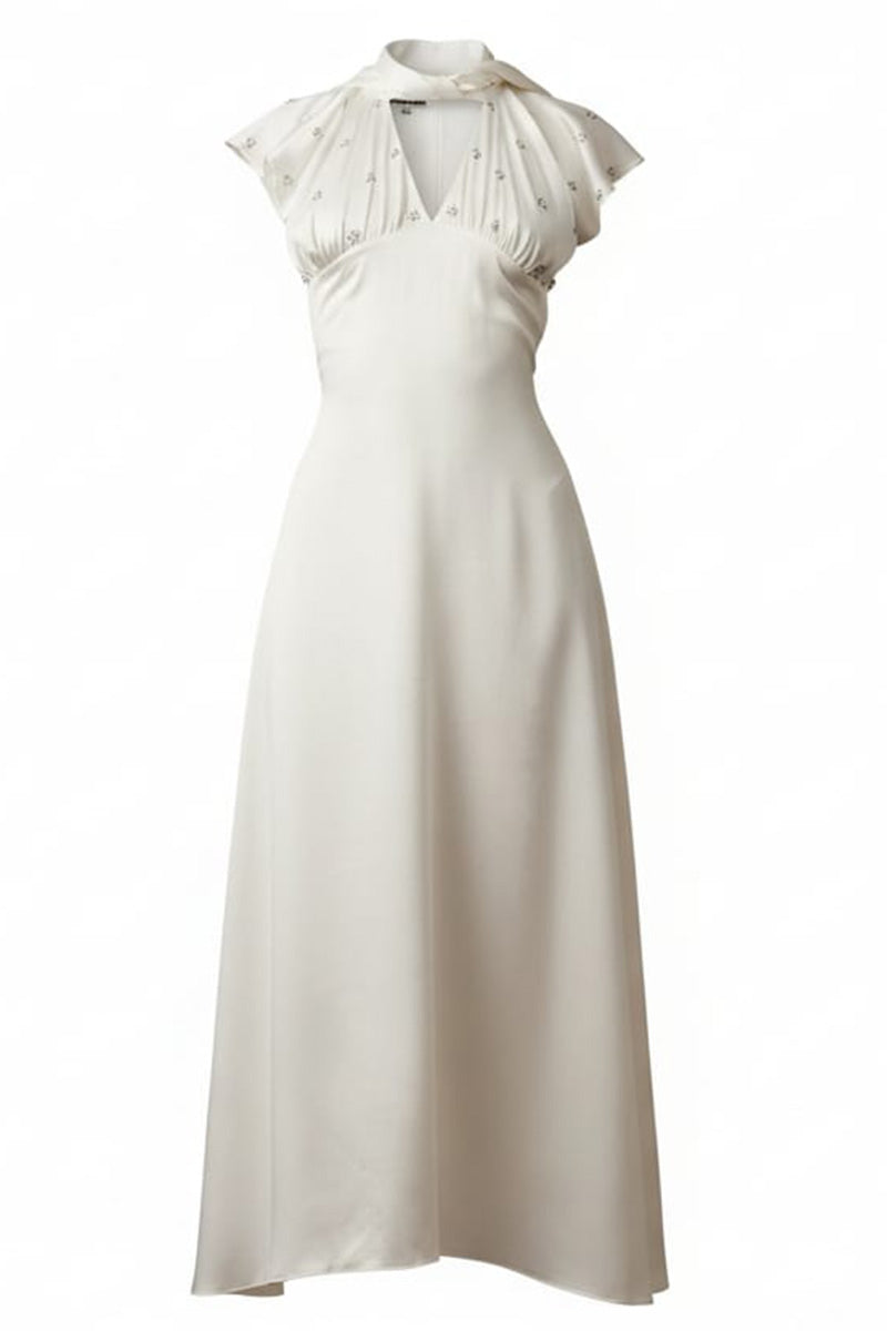 Elegant MUMTAAZ embellished pearl maxi dress by MASTANI, featuring intricate embroidery and a flowing silhouette.