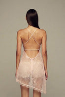 Pink Penelope mini dress by IKINITA, featuring a stylish fit and feminine design, shown on a hanger against a plain background.