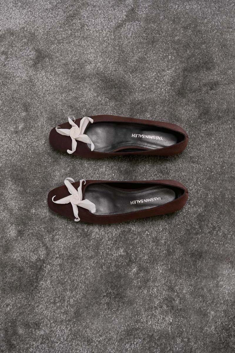 Brown YASSMIN SALEH Whispers Ballet flats with a sleek, minimalist design, shown from the front view.