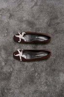 YASSMIN SALEH Whispers Ballet flats in brown, front view showing soft leather material and elegant ballet flat design.
